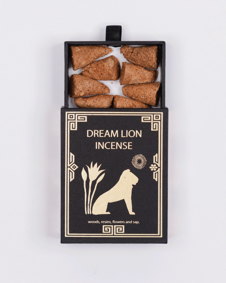 Box of Dream Lion incense sticks on a white background