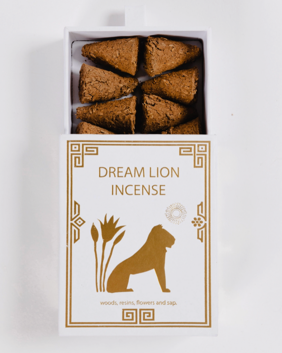 Box of Dream Lion Incense with incense cones on a white background