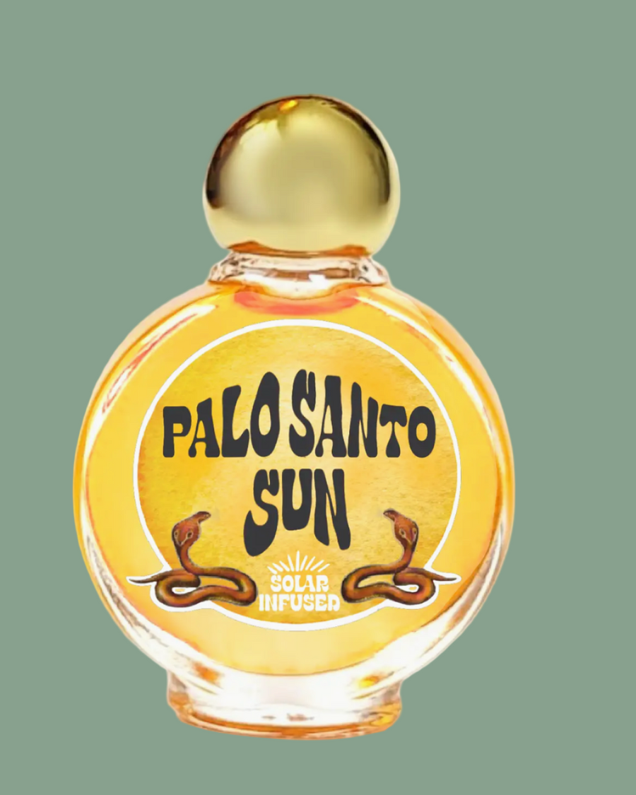 Glass bottle labeled 'Palo Santo Sun' with a gold cap on a white background