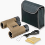 Binoculars with carrying case, strap, and cleaning cloth on a white background