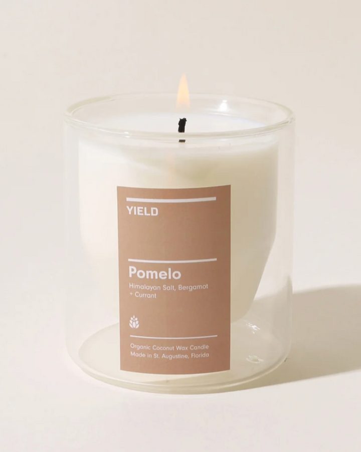 Candle with a label on a white background