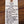 Handwritten tag on a wooden surface