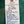 Handwritten wine label on a green surface