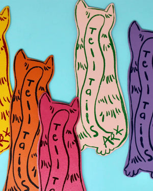 Double sided leather cat bookmark.