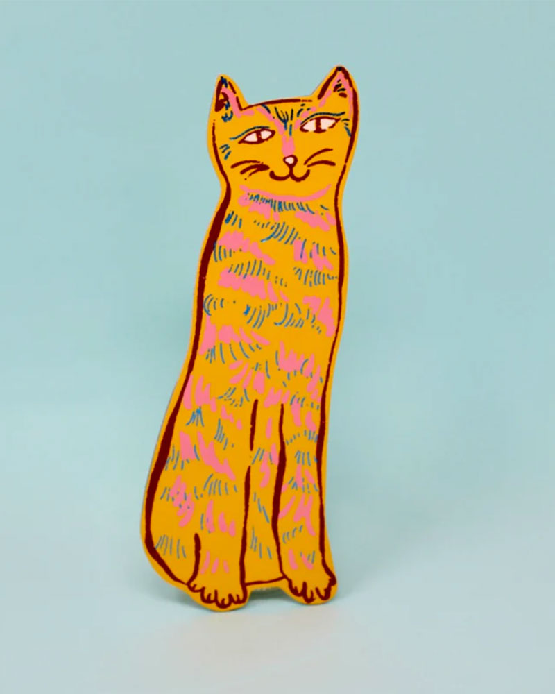 Double sided leather cat bookmark.