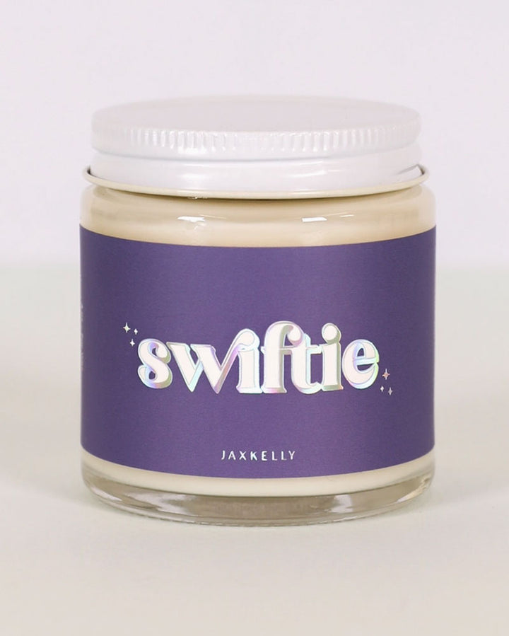 Swiftie is a mood-lifting blend of citrus, invigorating green grass, and comforting vanilla meant to cheer you up or help you wind down! Whether you're partial to one album, or listening to all the Eras in order, this candle smells like how Tay's lyrics make us feel!&nbsp;