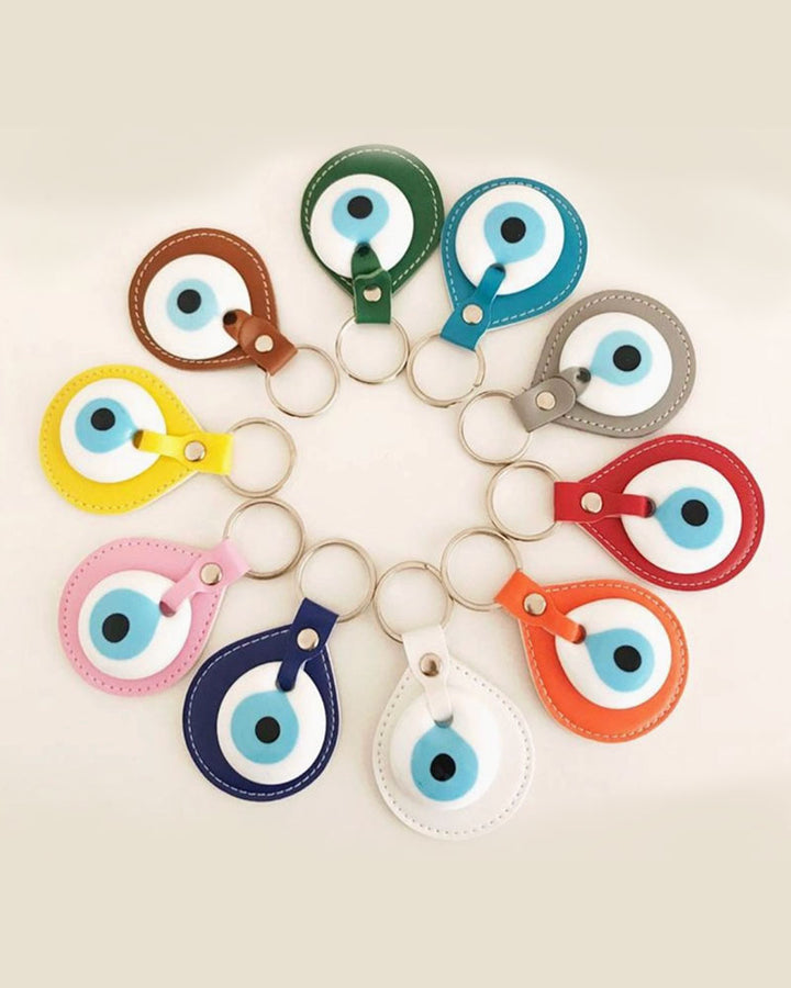 Hand blown glass Evil Eye and leather keychain .
