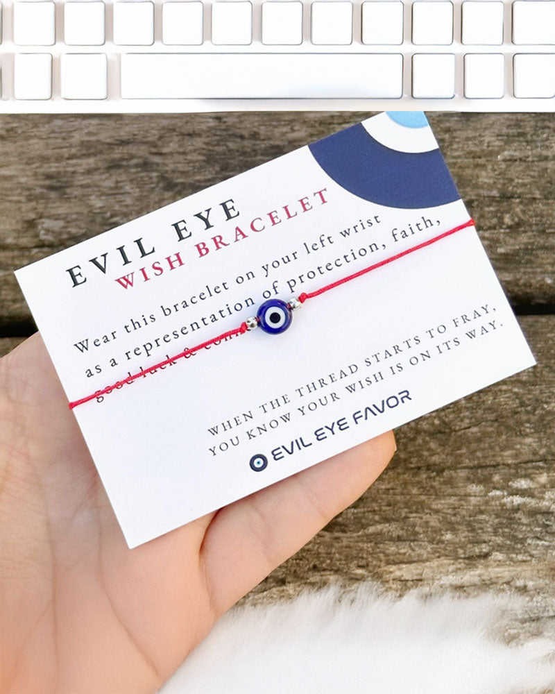 Handmade evil eye red cord wish bracelet. Wear this bracelet on your left wrist as a representation of protection, faith, good luck and connection. - wax cotton cord - these bracelets will fray and fall off - bracelets come with a wish card
