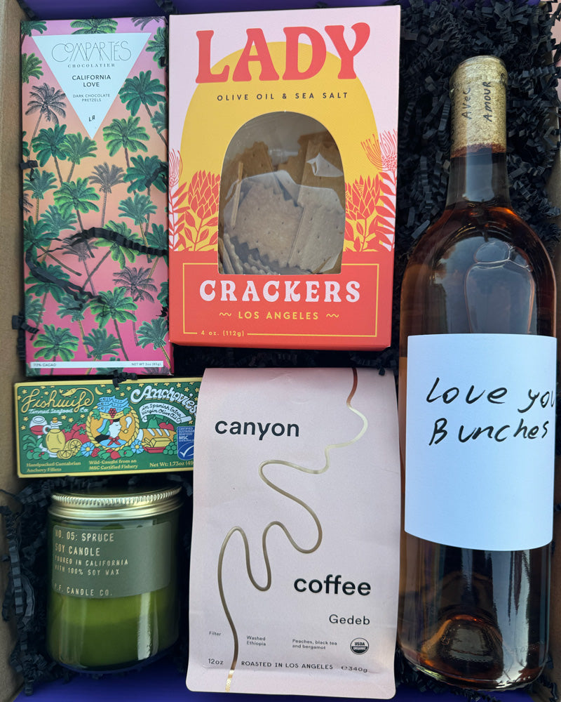 Our Local Love - Sssupermoon Box includes:

Stolpman Love You Bunches Red, Compartés California Love Dark Chocolate Salted Pretzel Bar, Fishwife Anchovies in Spanish EVOO, P.F. Spruce Jar Candle, Gedeb Canyon Coffee, and Lady Larder Lady Crackers