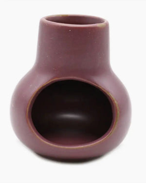 Mini Purple Ceramic Smudge Chimney Elevate your Smudging rituals and infuse your space with the soothing and cleansing aromas of these ancient tools with our Ceramic Smudge Burner Chimney. Exquisitely crafted, this versatile accessory enhances your spiritual practices while adding an element of elegance to your sacred space. Meticulously constructed from high-quality ceramic, our Smudge Burner Chimney showcases a unique and innovative design. The cylindrical chimney shape provides a secure and well-ventilat