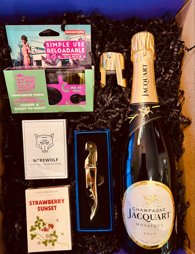 Our Tonight's The Night Box includes:

Jacquart Mosaique Brut, reloadable camera, Werewolf card game, Strawberry Sunset card came, stopper and opener.

*Substitutions of similar items may be made if products shown in this box are sold out at the time of ordering.