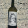 100% Mysterious Field Blend Bergenland, Austria  Lady winemaker - Stepanie Tscheppe. All natural. Drink the woman behind the mask. Citrus + herbs. Big ol' daydrinker like your college bestie! Pears + pleasant minerals. Liter!