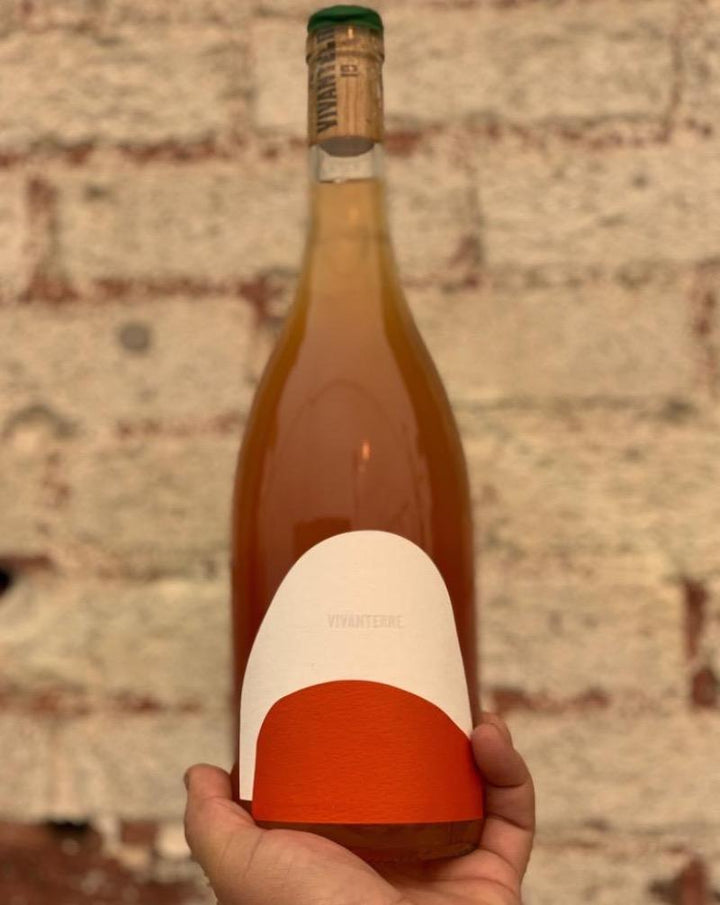 Sylvaner/Ugni Blanc/Gewurztraminer Vin de France.  Woman winemaker - Justine Loiseau. Woman owner - Rosie Assoulin. All natural. Orange wine. At the intersection of Serious St. and Chuggable Ave. Savory + salty with fruit punch vines. Perfect taco wine. Limited and Lovely.