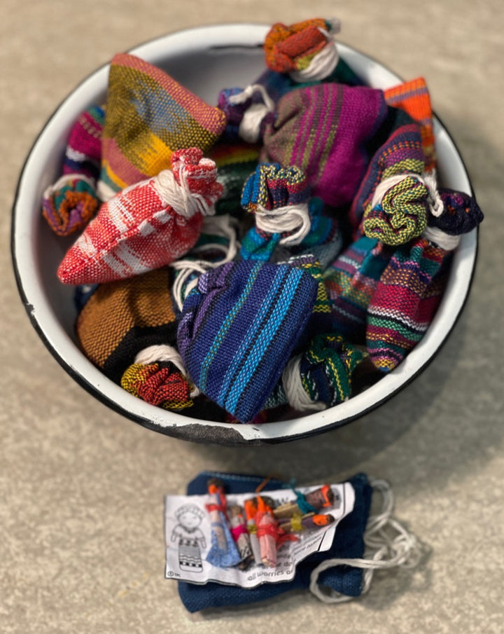 Worry Dolls!  Legend has it, you tell the dolls all your troubles, put them under your pillow and the next morning all your worries are gone! Worth a shot, right?!