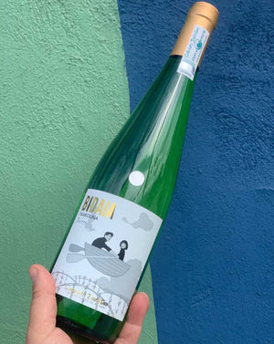 Hondarribi Zuri Basque, Spain.  Woman winemaker - Maria Hernandez. Hand picked + sustainably farmed. Bubbly lemon/lime. Crackling minerality. Spritzy + zippy like a wind up toy on your tongue. Lean + linear. Thirst quencher.