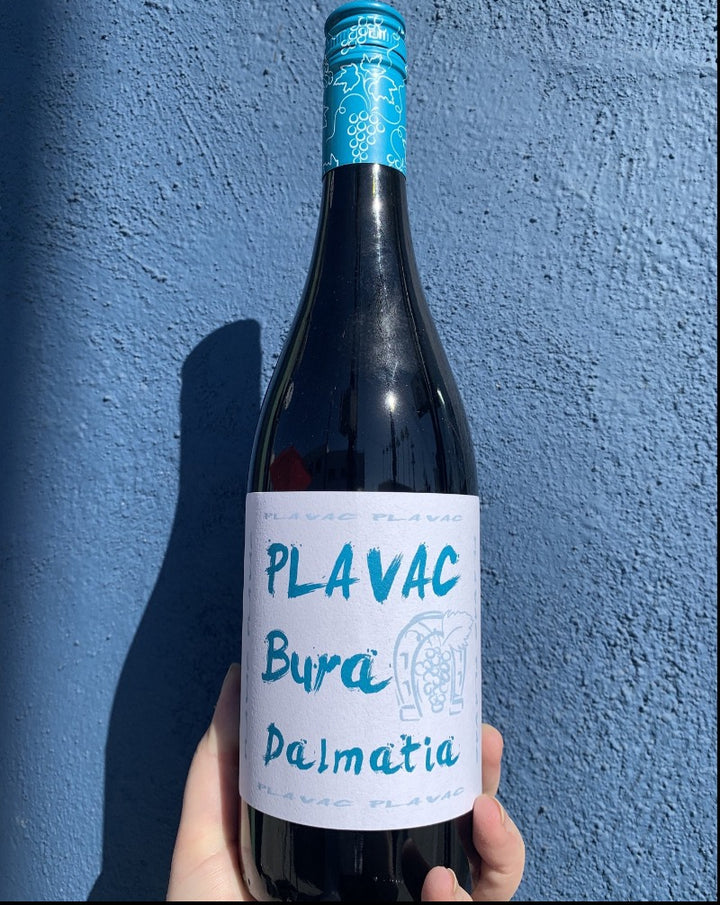 100% Plavac Mali Dalmatia, Croatia.  Woman winemaker - Antonia Mrgudić. All natural. Chilled red  Bright & vivacious. Black currant + dust. Like a bouncy house of minerals and fruit jumping in your mouth. Raspberry tabacco. Spice and cloves.
