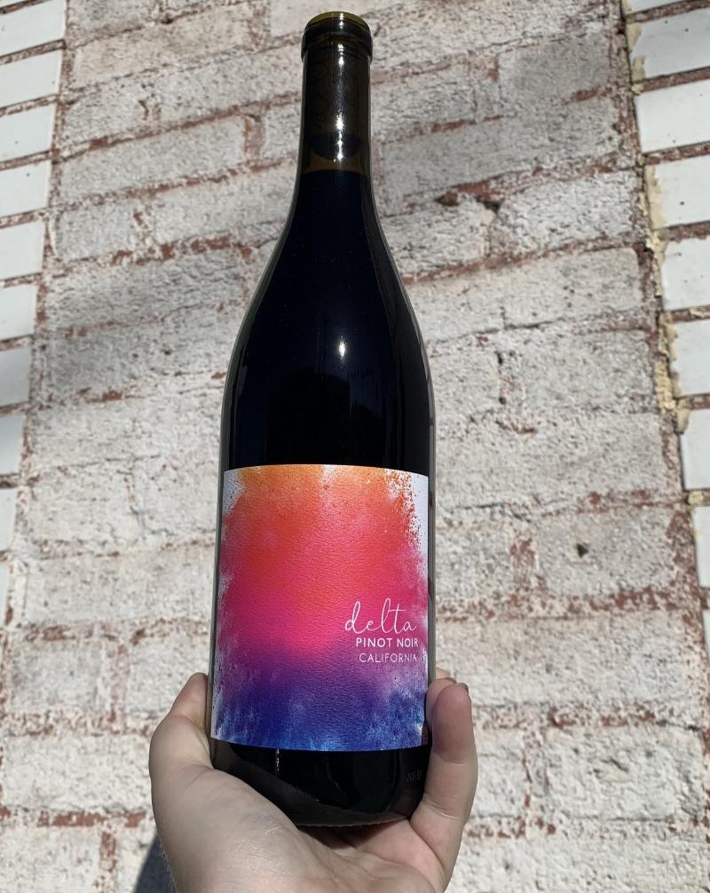 100% Pinot Noir. Healdsburg, California.  Woman winemaker - Alexis Iaconis. All natural. Black cherry cola. Baked strawberry and rhubarb tart. Butter chocolate. Lavender + roses. $1 is donated per bottle to help fight climate change.
