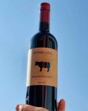 Zweigelt/St. Laurent. Burgenland, Austria.  Woman winemaker - Angela Michlits. All natural. Chillable red. Like a zippy red scooter tootling around minerally cobblestone streets with a tickly, juicy mist and dry grapey breeze, on your senses.