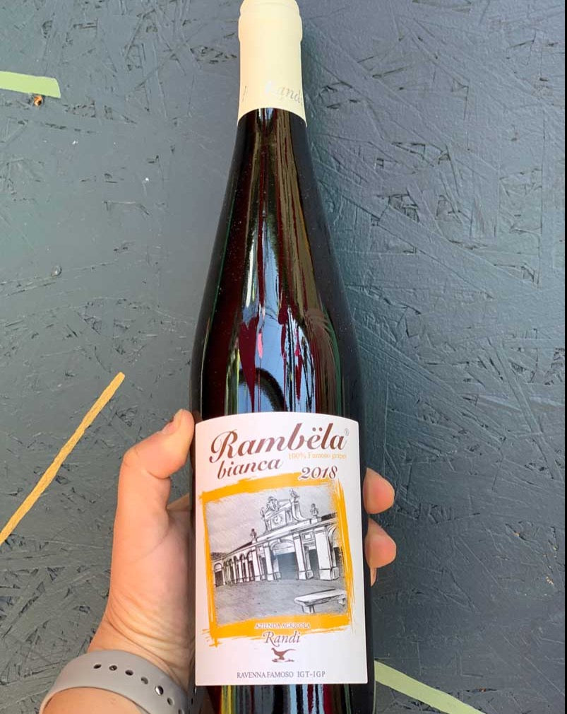 Rambela Randi Famoso 100% Famoso Emilia Romagna, Italy.  Woman wine grower - Giovanna Randi. All natural. Sunny day, sweeping the clouds away. On my way to where the wine is neat. Can you tell me how to get to Hoover st.?! Baby orange. 4 days on skins. Soft, sunny, salty, smooth.