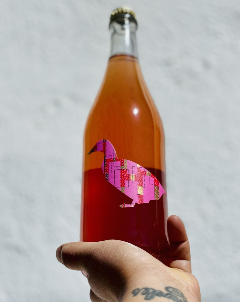 95% Fennão Pirces. 5% Baga. Bairrada, Portugal.  Woman winemaker - Maria Pato. All natural. Pet-nat (bubbles). Cranberry crusher. Fluorescent peaches. Day 2 - Bananas! Roses + mango. A fizzy stroll on a tropical island.