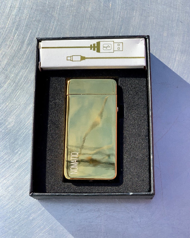 Golden Dual Arc (Electric) Lighter (comes with USB charger) -Rechargeable via USB connection on bottom. Super green way to light all your fires in your life!