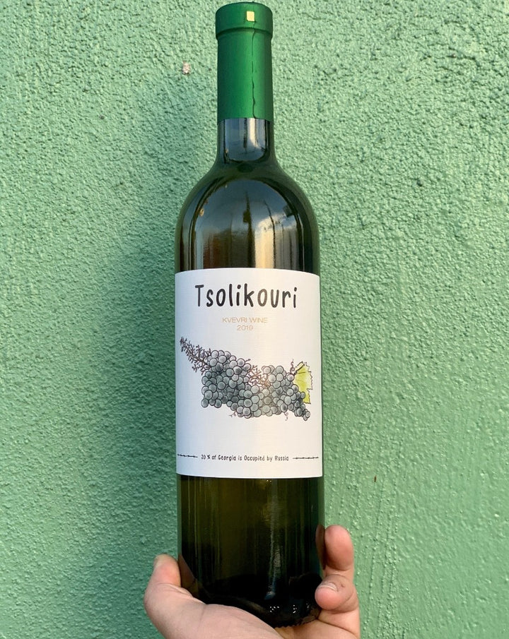 100% Tsolikouri. Kakheti, Georgia  Woman winemaker - Keto Ninidze. All natural. Orange wine. Bonfires and smoke signals wafting up through forest trees after a rain storm. Lip smaking citrus explosion. Wild flower and wild ponies.