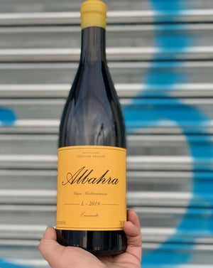 Grenacha Tintorea. Canary Islands, Spain.  Woman winemaker - Laura Ramos. All natural. Super allocated + low production. Savory + succulent. WILF - Wine I'd like to F##k Rich + juicy with banging acidity. Pepper + plums Wispy tannins.