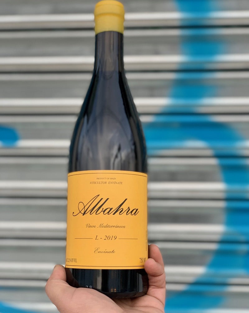 Grenacha Tintorea. Canary Islands, Spain.  Woman winemaker - Laura Ramos. All natural. Super allocated + low production. Savory + succulent. WILF - Wine I'd like to F##k Rich + juicy with banging acidity. Pepper + plums Wispy tannins.