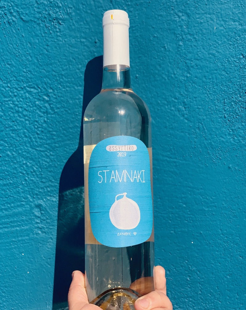 100% Assyrtiko. Peloponnese, Greece.  Woman winemaker - mother + daughter Maria + Fotini. All natural. Super briney. Dry melon drops. Fresh, light and shiny bright. White hot Greek. Lemon zesty olives. Dusky minerals.