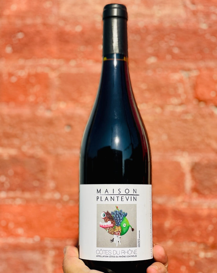 60% Grenache 20% Syrah 10% Carignan 10% Cinsault Côtes du Rhone, France  Woman winemaker - Akiko Plantevin. All natural. Classic and clean, shiny and rustic. Varying fruit edge from young raspberries to rich black currants. Mushroom realness. Tobacco and mint.