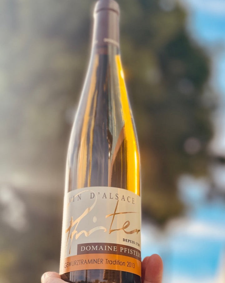 1000% Gewurtztraminer. Alsace, France.  Woman winemaker - Mélanie Pfister. All natural. Mega aromatics of honeyed peaches, dates, lychee and dry rose petals. In the mouth dry, rich with and oily viscosity.  Dusty wet cellar.