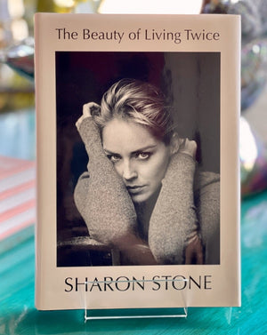 In The Beauty of Living Twice, Stone chronicles her efforts to rebuild her life and writes about her slow road back to wholeness and health. In a business that doesn’t accept failure, in a world where too many voices are silenced, Stone found the power to return, the courage to speak up, and the will to make a difference in the lives of men, women, and children around the globe.