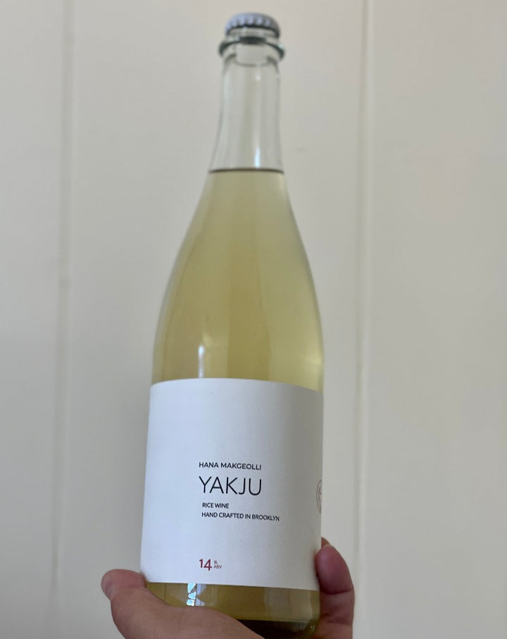 Female Winemaker (Brewer) - Alice YAKJU 14 | Historically reserved for the noble class, YAKJU is the precious clarified portion of a brew that captures the essence of sool in its purest form. At 14% ABV, the YAKJU is light in body, dry, refined, and bright with naturally occurring lactic acid.