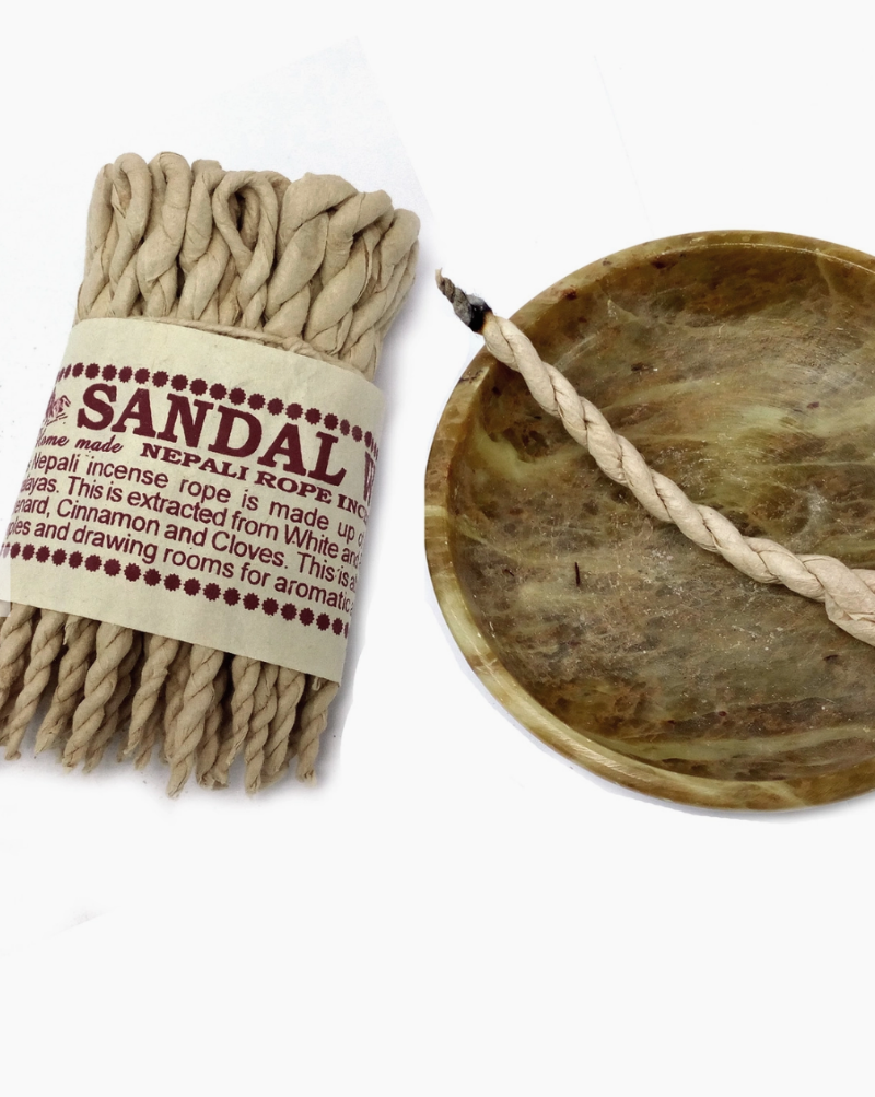 This Nepali incense rope is made up of herbs found in the high Himalayas, extracted from White and Red Sandalwood, Saldup, Spikenard, Cinnamon and Cloves. This is abundantly used in Stupas, Temples and drawing rooms for aromatic ambience. One bundle contains 50 incense ropes, 11cm long each. Burn time per rope is approx 15min.