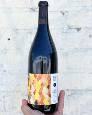 60% Nero d'Avola, 40% Zinfandel Mendocino, California.  Woman winemaker - Martha Stoumen. All natural. Dark cherries floating in black tea with wild herbs. Mood swings in a glass of fresh + delightful to deep + moody. Juicy kisses.