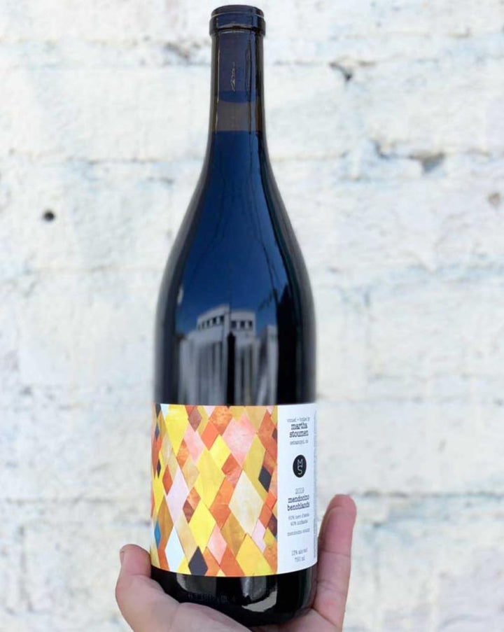 60% Nero d'Avola, 40% Zinfandel Mendocino, California.  Woman winemaker - Martha Stoumen. All natural. Dark cherries floating in black tea with wild herbs. Mood swings in a glass of fresh + delightful to deep + moody. Juicy kisses.