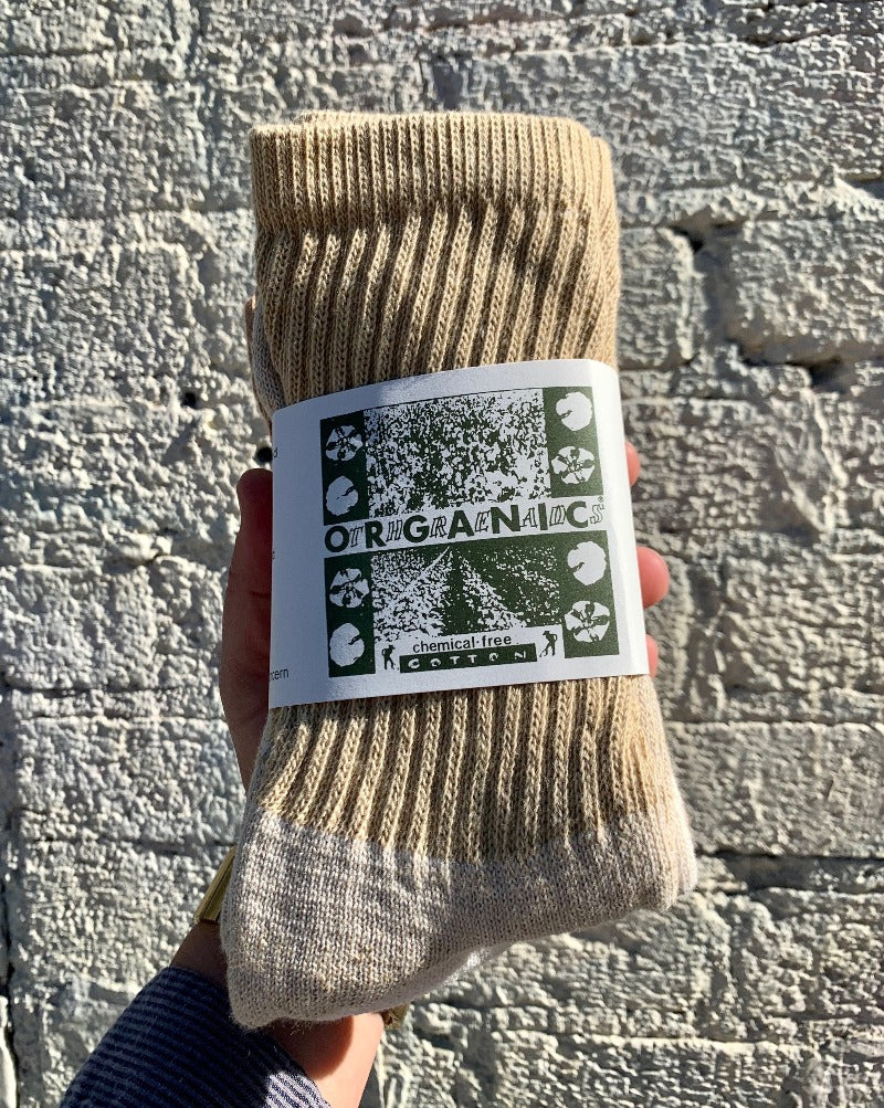 The best socks ever and eco-friendly! Enjoy the comfort of organic cotton grown by Sally Fox and manufactured in the U.S.A. These comfy socks are roomy and made from organic cotton that grows naturally in earth tone colors, no dye here! Air dry or dry in low heat if they're a little big, then they will shrink to fit! S/M.  Three pairs of earth tone socks to a pack.