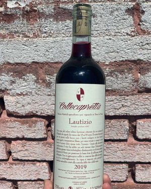 100% Ciliegiolo Umbria, Italy.  Woman winemaker - Amalisa Collecapretta. All natural. Chillable red. Like laying in salty sand by a cranberry, balsamic sea looking up at puffy cherry clouds with a cedar and chili pepper breeze.