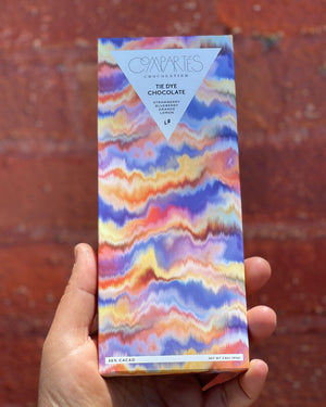 BRAND NEW Limited Edition TIE DYE CHOCOLATE BAR is a rainbow swirl chocolate art masterpiece!  Each bar is handmade in Los Angeles with 4 different chocolates infused with strawberry, blueberry, lemon and orange in gorgeous shades of pink, blue, yellow and orange, then all swirled together into a rainbow tie dye chocolate dream, unlike any other chocolate you've seen (or tasted) before!