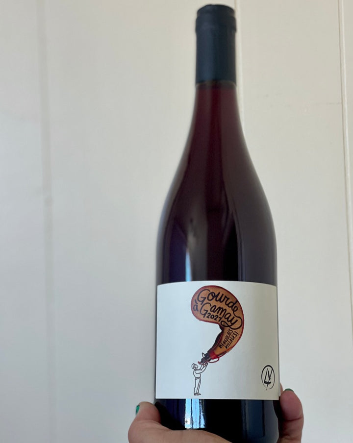 100% Gamay Beaujolais, France.  Woman winemaker - Laura Lardy All natural. Chillable red. 4th generation Beaujolais winemaker. Sexy, fruity Boi! Light hearted and lean bodied. Banana tingle. Glou Glou (glug glug). Cherry spice.