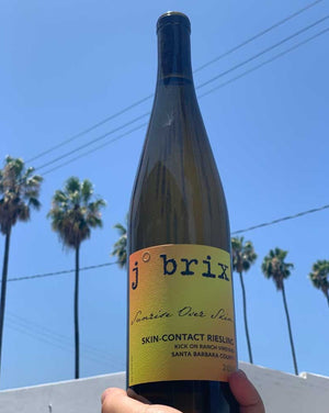 100% Riesling Santa Barbara, California.  Woman winemaker - Emily Towe. All natural. Orange wine. Only 48 cases made! Dry and textured. Take a big bite of my perfect summer peach. Gum smackin' flavor train.