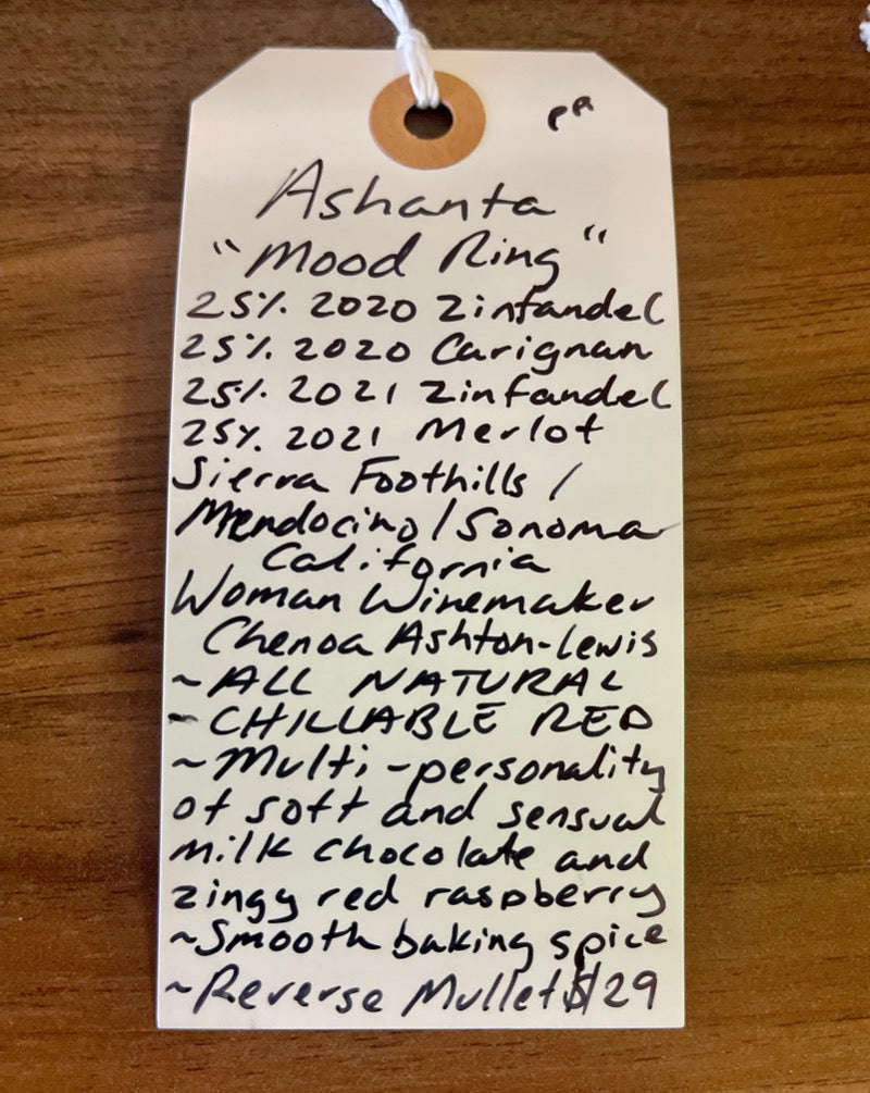 25% 2020 Zinfandel - 25% 2020 Carignan - 25% 2021 Zinfandel - 25% 2021 Merlot Sierra Foothills/Mendocino/Sonoma, California.  African American Woman winemaker - Chenoa Ashton-Lewis. All natural. Chillable red. Multi personality of soft and sensual milk chocolate and zingy red raspberry nerve. Smooth baking spice. Reverse mullet. 